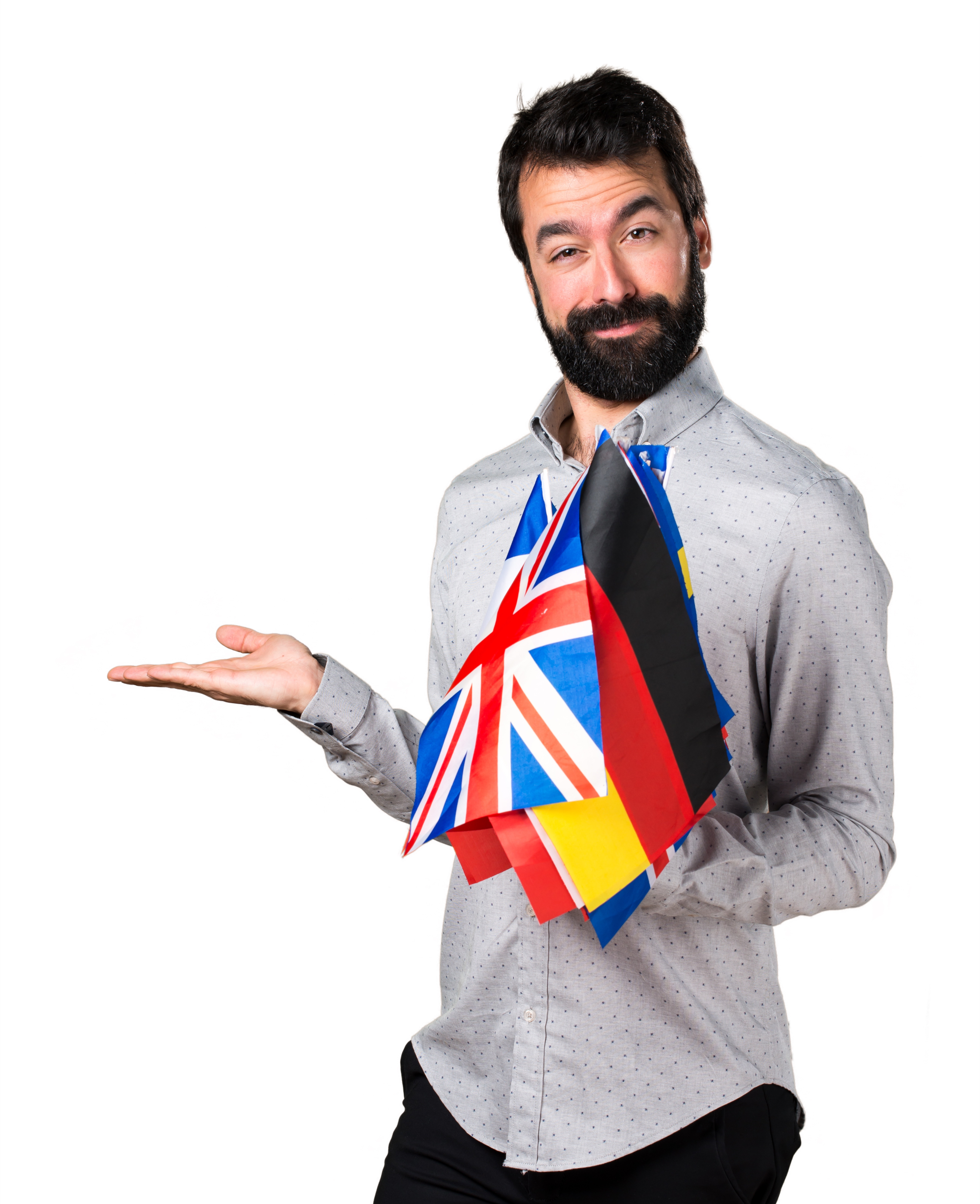 Handsome man with beard holding many flags and holding something