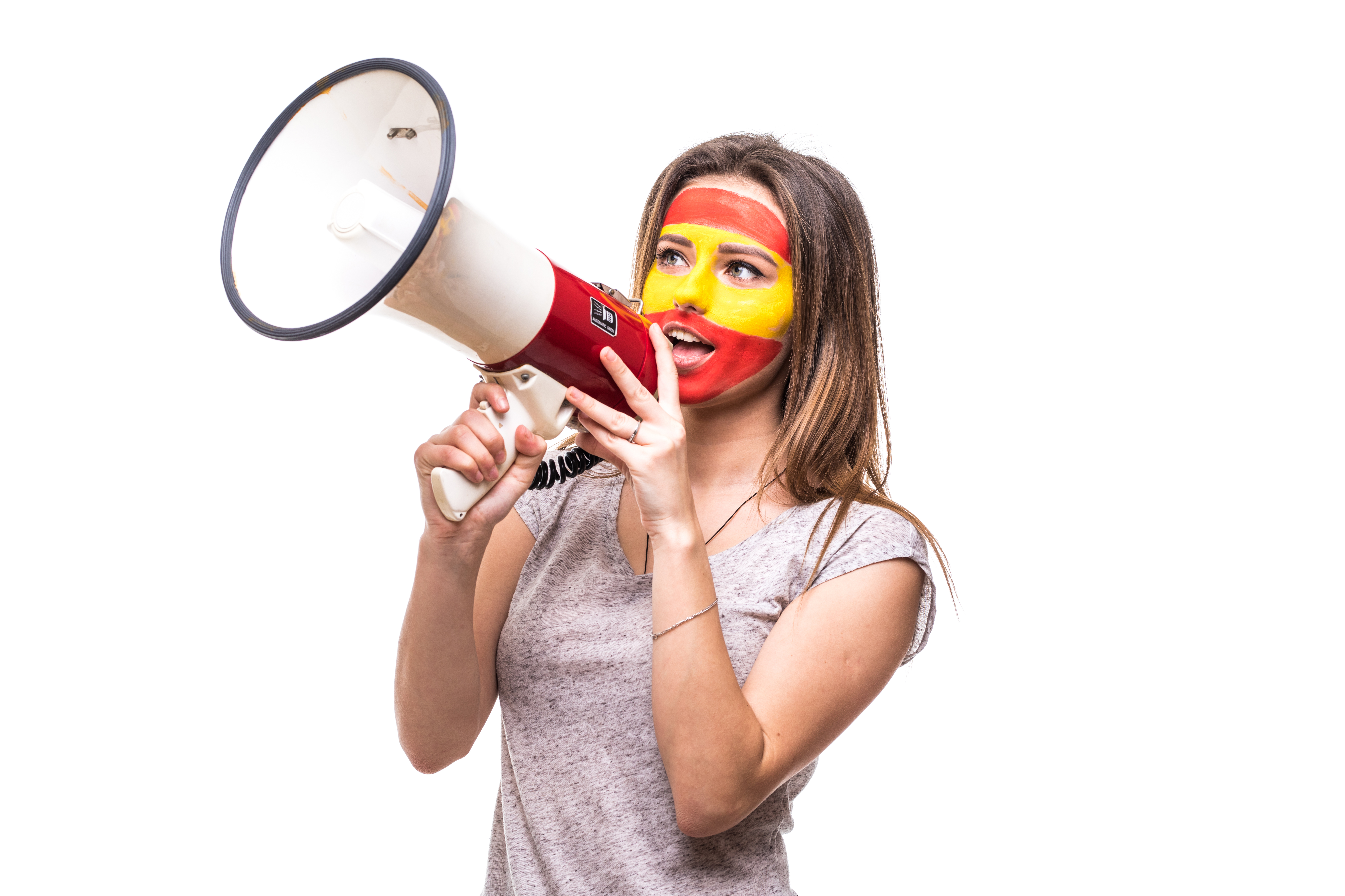 woman supporter loyal fan of Spain national team painted flag face get happy victory screaming into megaphone with pointed hand
